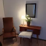 Huoneita Puusaunalla Privatunterkunft *