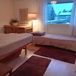 Huoneita Puusaunalla *