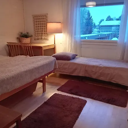 Huoneita Puusaunalla *